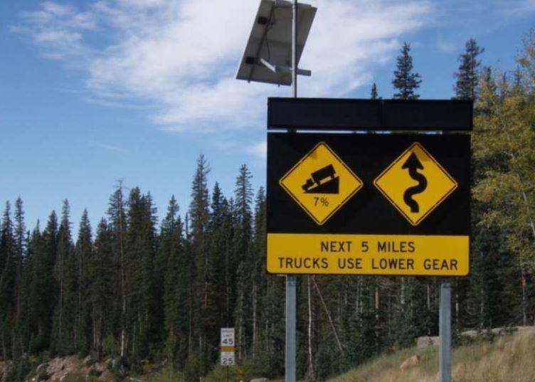 Next 5 Miles Trucks Use Lower Grade sign in Wolf Creek Pass