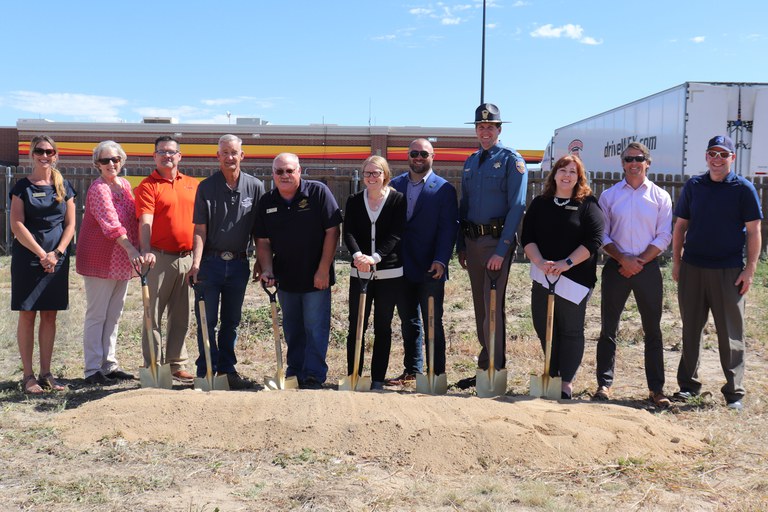 Ribbon cutting group at the Loves Groundbreaking Ceremony in Bennett Colorado